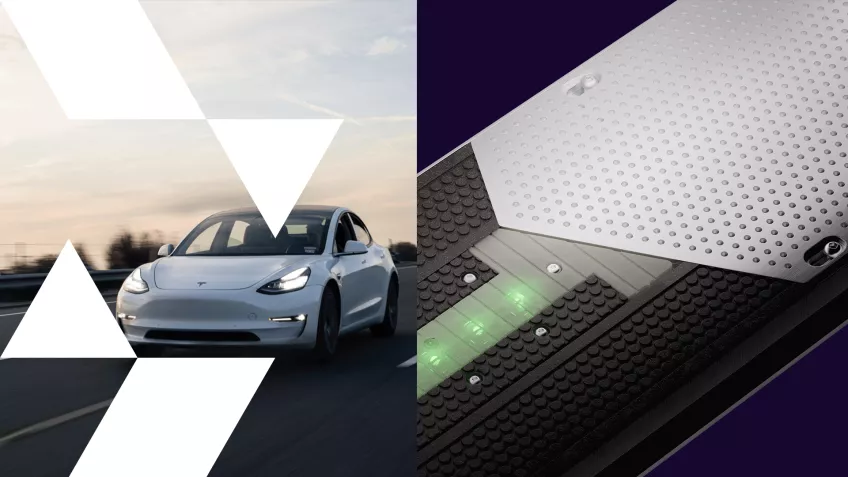 Bild. Elektrisk bil till vänster och Elonroads vägbana till höger.